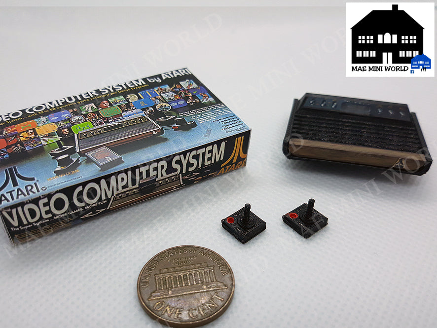 ATARI 2600 Miniature console with 2 controllers and box. Miniature 3D