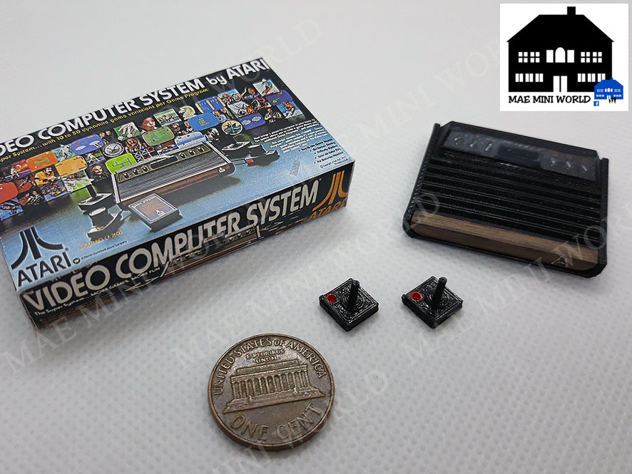 ATARI 2600 Miniature console with 2 controllers and box. Miniature 3D
