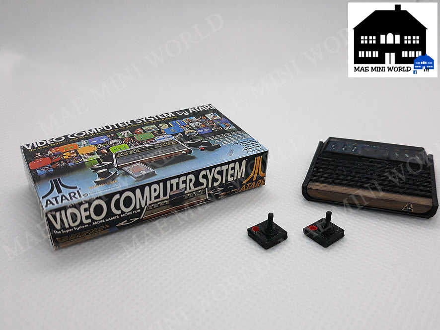 ATARI 2600 Miniature console with 2 controllers and box. Miniature 3D