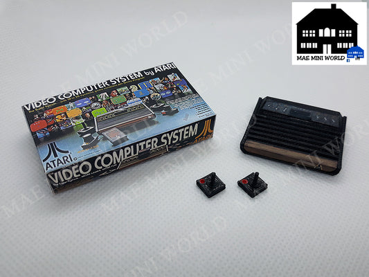 ATARI 2600 Miniature console with 2 controllers and box. Miniature 3D