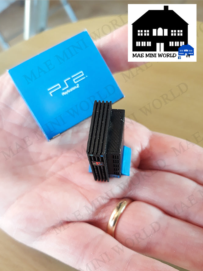 PS2 Miniature console with box. Miniature 3D