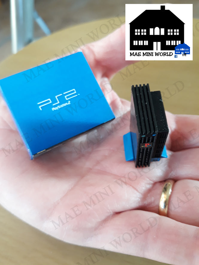 PS2 Miniature console with box. Miniature 3D